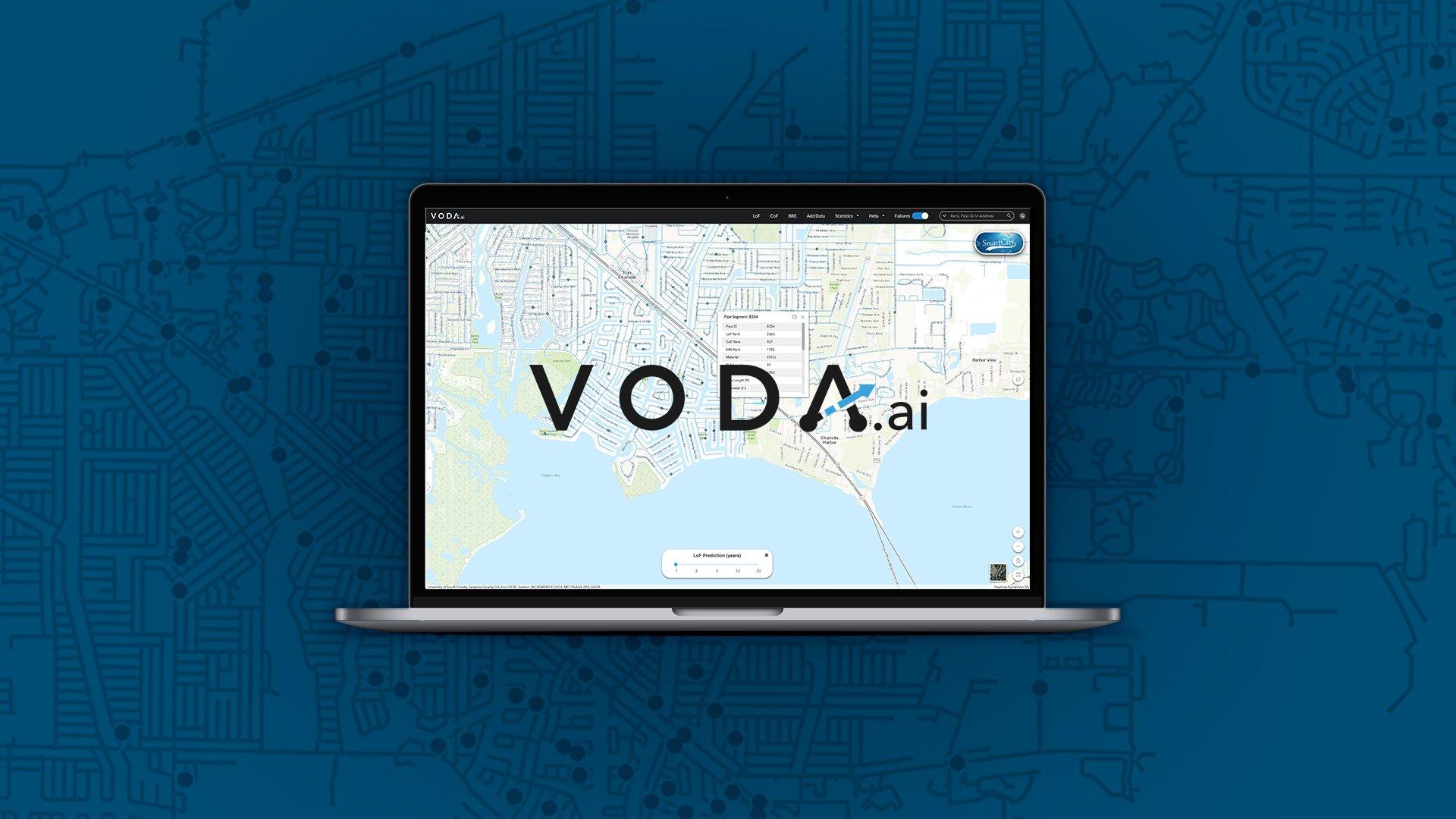 A graphic of an open slim laptop; the screen shows the VODA.ai logo and a table of pipe segment details laid over a map of a city next to a body of water. The laptop graphic is laid over a blue map with dark blue dots marking pipe locations.