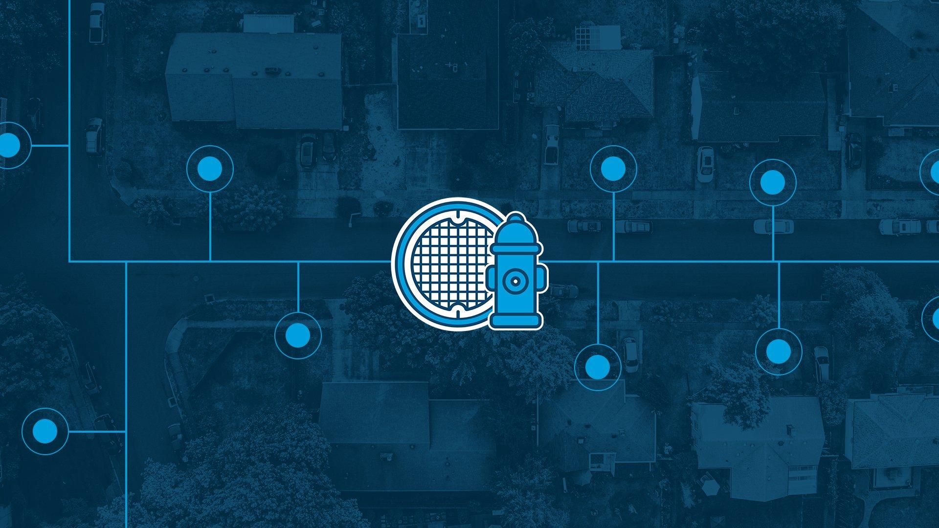 An icon of a white maintenance hole cover and a blue fire hydrant is laid over a blue-shaded image of a bird’s-eye view of a residential neighborhood. A light blue line over the street maps out branches that break off to each home’s front yard to indicate flow monitoring applications.