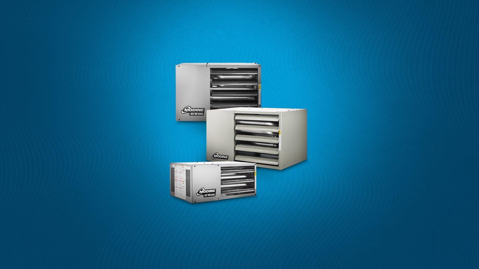 Silo image of 3 Modine unit heaters against blue background. 